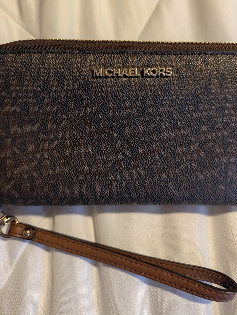 Two Michael Kors Wallets, Brown Signature Wristlet And Mauve Colored One